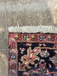 A Persian Heriz rug with 'Ahar' design, wool on cotton, 20th C.