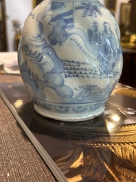 A twisted blue and white Dutch Delft chinoiserie jug, 17th C.