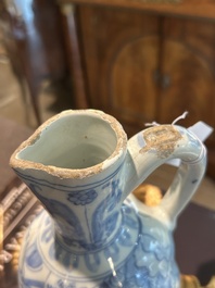 A twisted blue and white Dutch Delft chinoiserie jug, 17th C.