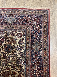 A Persian Isfahan rug with floral design, wool on silk, first half 20th C.