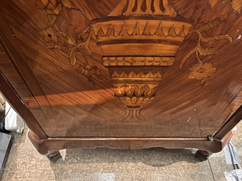 A pair of French Louis XVI style single door hall cabinets with floral marquetry, gilt bronze mounts and marble tops, 19th C.