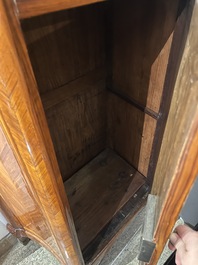 A pair of French Louis XVI style single door hall cabinets with floral marquetry, gilt bronze mounts and marble tops, 19th C.