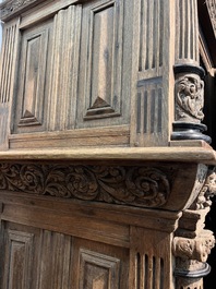 A Dutch elaborate carved oak Renaissance four-door cupboard, 17th C.