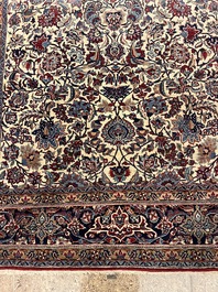 A Persian Isfahan rug with floral design, wool on silk, first half 20th C.