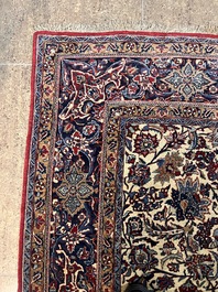 A Persian Isfahan rug with floral design, wool on silk, first half 20th C.