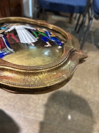 Two Limoges enamel plaques and a pax with religious subjects, 19th/20th C.