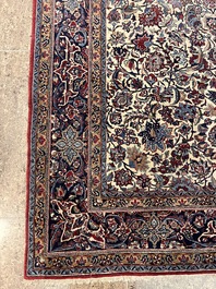 A Persian Isfahan rug with floral design, wool on silk, first half 20th C.