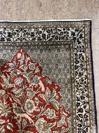 A Persian Qom (Qum/Ghom) silk rug with 'Mihrab' design, 20th C.