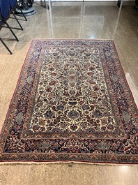 A Persian Isfahan rug with floral design, wool on silk, first half 20th C.