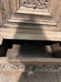 A Dutch elaborate carved oak Renaissance four-door cupboard, 17th C.