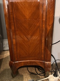 A pair of French Louis XVI style single door hall cabinets with floral marquetry, gilt bronze mounts and marble tops, 19th C.