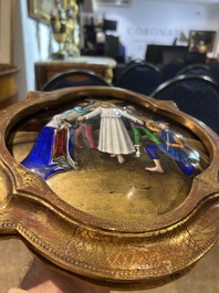 Two Limoges enamel plaques and a pax with religious subjects, 19th/20th C.