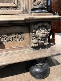 A Dutch elaborate carved oak Renaissance four-door cupboard, 17th C.