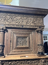 A Dutch elaborate carved oak Renaissance four-door cupboard, 17th C.