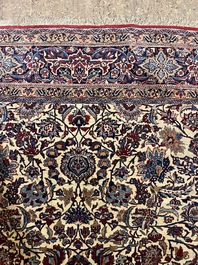 A Persian Isfahan rug with floral design, wool on silk, first half 20th C.
