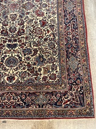 A Persian Isfahan rug with floral design, wool on silk, first half 20th C.