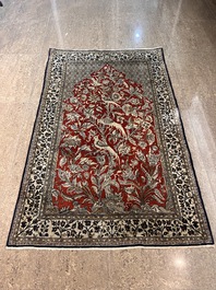 A Persian Qom (Qum/Ghom) silk rug with 'Mihrab' design, 20th C.