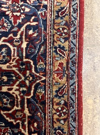 A Persian Isfahan rug with floral design, wool on silk, first half 20th C.