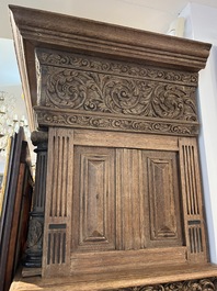 A Dutch elaborate carved oak Renaissance four-door cupboard, 17th C.
