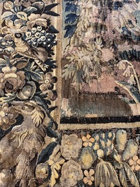 A Flemish verdure wall tapestry with two swans in a lake, probably Oudenaarde, late 17th C.