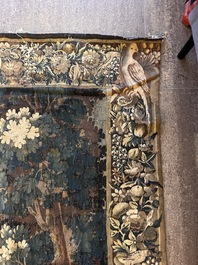 A Flemish verdure wall tapestry with two swans in a lake, probably Oudenaarde, late 17th C.