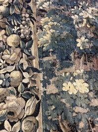 A Flemish verdure wall tapestry with two swans in a lake, probably Oudenaarde, late 17th C.