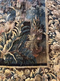 A Flemish verdure wall tapestry with two swans in a lake, probably Oudenaarde, late 17th C.
