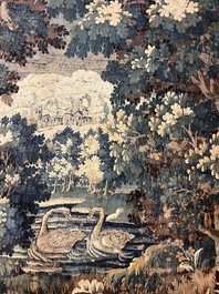 A Flemish verdure wall tapestry with two swans in a lake, probably Oudenaarde, late 17th C.
