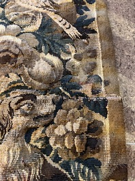 A Flemish verdure wall tapestry with two swans in a lake, probably Oudenaarde, late 17th C.