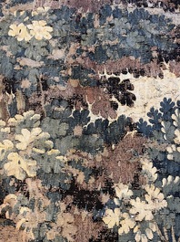 A Flemish verdure wall tapestry with two swans in a lake, probably Oudenaarde, late 17th C.