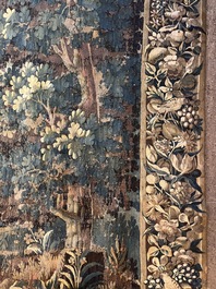 A Flemish verdure wall tapestry with two swans in a lake, probably Oudenaarde, late 17th C.