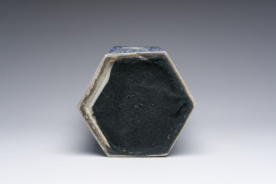 A Chinese reticulated hexagonal blue ground famille rose hatstand, 19th C.