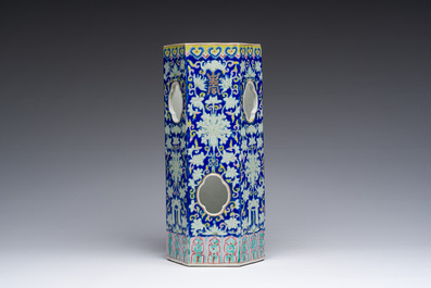 A Chinese reticulated hexagonal blue ground famille rose hatstand, 19th C.
