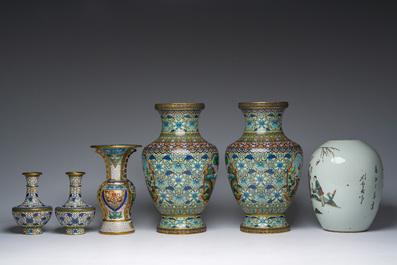 Five Chinese cloisonn&eacute; vases with cranes, taotie masks and floral design and a famille rose jar and cover, 19th/20th C.