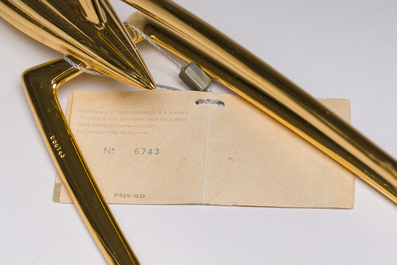 Philippe Starck (1949): Two 'Juicy Salif' citrus squeezers for Alessi, aluminium and gilt aluminium, Italy, last quarter 20th C.