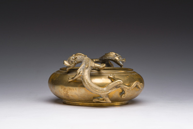 A Chinese bronze censer with relief design, Xuande mark, 19th/20th C.