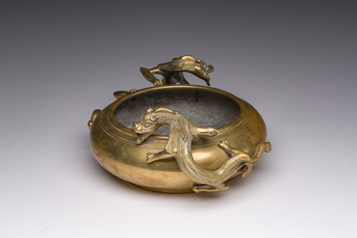 A Chinese bronze censer with relief design, Xuande mark, 19th/20th C.