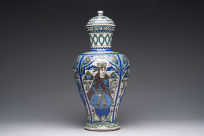 A large Persian pottery vase and cover with figurative design, 20th C.
