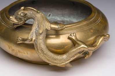 A Chinese bronze censer with relief design, Xuande mark, 19th/20th C.