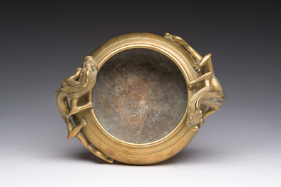 A Chinese bronze censer with relief design, Xuande mark, 19th/20th C.