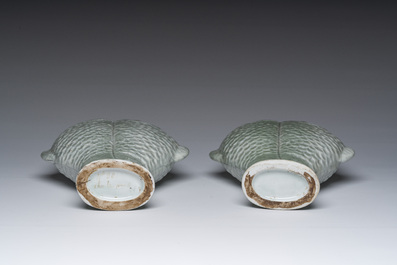 A pair of Chinese celadon glazed 'twin fish' vases, 19th/20th C.