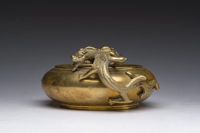 A Chinese bronze censer with relief design, Xuande mark, 19th/20th C.