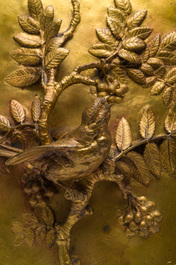 Paul Comol&eacute;ra (1813-1890): Een plaquette met reli&euml;fdecor van een vogel op een bloesemtak, verguld brons