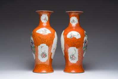A pair of Chinese famille rose coral red-ground vases, Qianlong mark, Republic, 20th C.