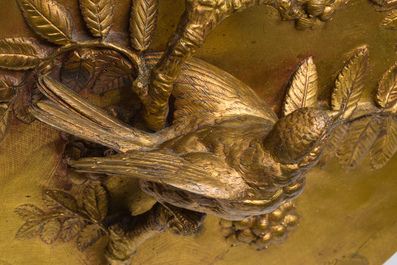 Paul Comol&eacute;ra (1813-1890): Een plaquette met reli&euml;fdecor van een vogel op een bloesemtak, verguld brons