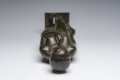 Andr&eacute; Taeckens (1906-1965): Femme nue debout portant un collier, bronze patin&eacute;, marque de fonderie 'Brons G. Vindevogel'