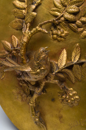 Paul Comol&eacute;ra (1813-1890): Een plaquette met reli&euml;fdecor van een vogel op een bloesemtak, verguld brons