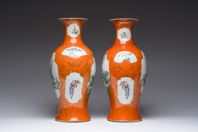 A pair of Chinese famille rose coral red-ground vases, Qianlong mark, Republic, 20th C.