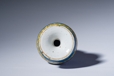 A polychrome Brussels faience caster with an animated river landscape, 18th C.