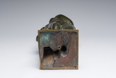 Andr&eacute; Taeckens (1906-1965): Femme nue debout portant un collier, bronze patin&eacute;, marque de fonderie 'Brons G. Vindevogel'